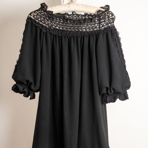Off-shoulder black dress